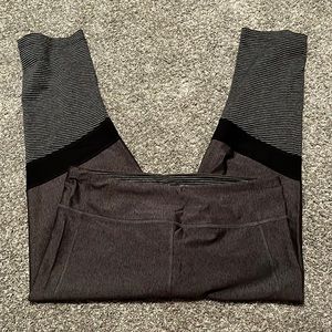 Under Armour dark gray with black strip leggings